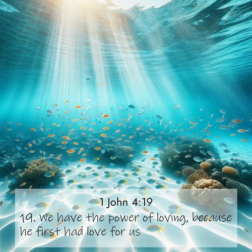 BBE 1 John 4:19 overlaying nature image scene: Reef fish swirl in perfect formation through crystal waters. Sunlight creates shifting patterns on white sand below.;19. We have the power of loving, because he first had love for us.